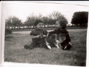 My cousin Michele and me playing with a kitty!